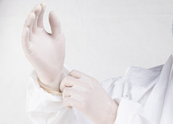 Το ιατρικό μίας χρήσης λατέξ φορά γάντια στη διαφανή ελαστική προστασία βαθμού τροφίμων σκονών ελεύθερη